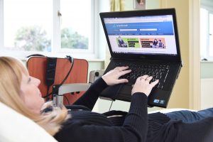 disabled person using laptop for job searching
