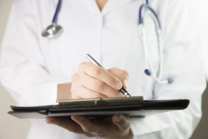 healthcare professional taking medical details