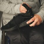 Person showing Friendly Shoes