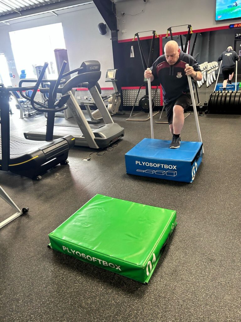 colin philps in the gym using a plyosoftbox step