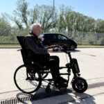 Male wheelchair user using Invictus equipment